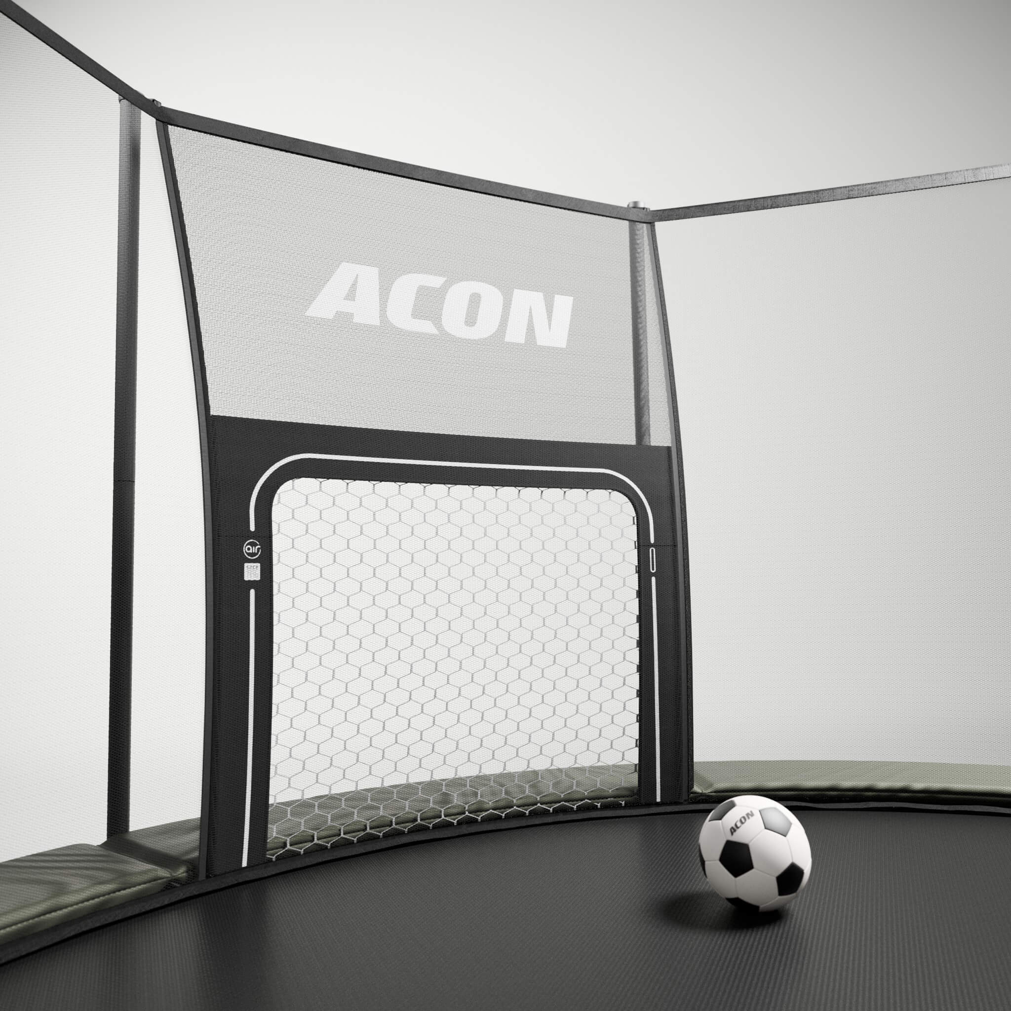 ACON Air Fußballtor für ACON Air Rundtrampoline installiert an einem ACON Air Rundtrampolin vor grauem Hintergrund.