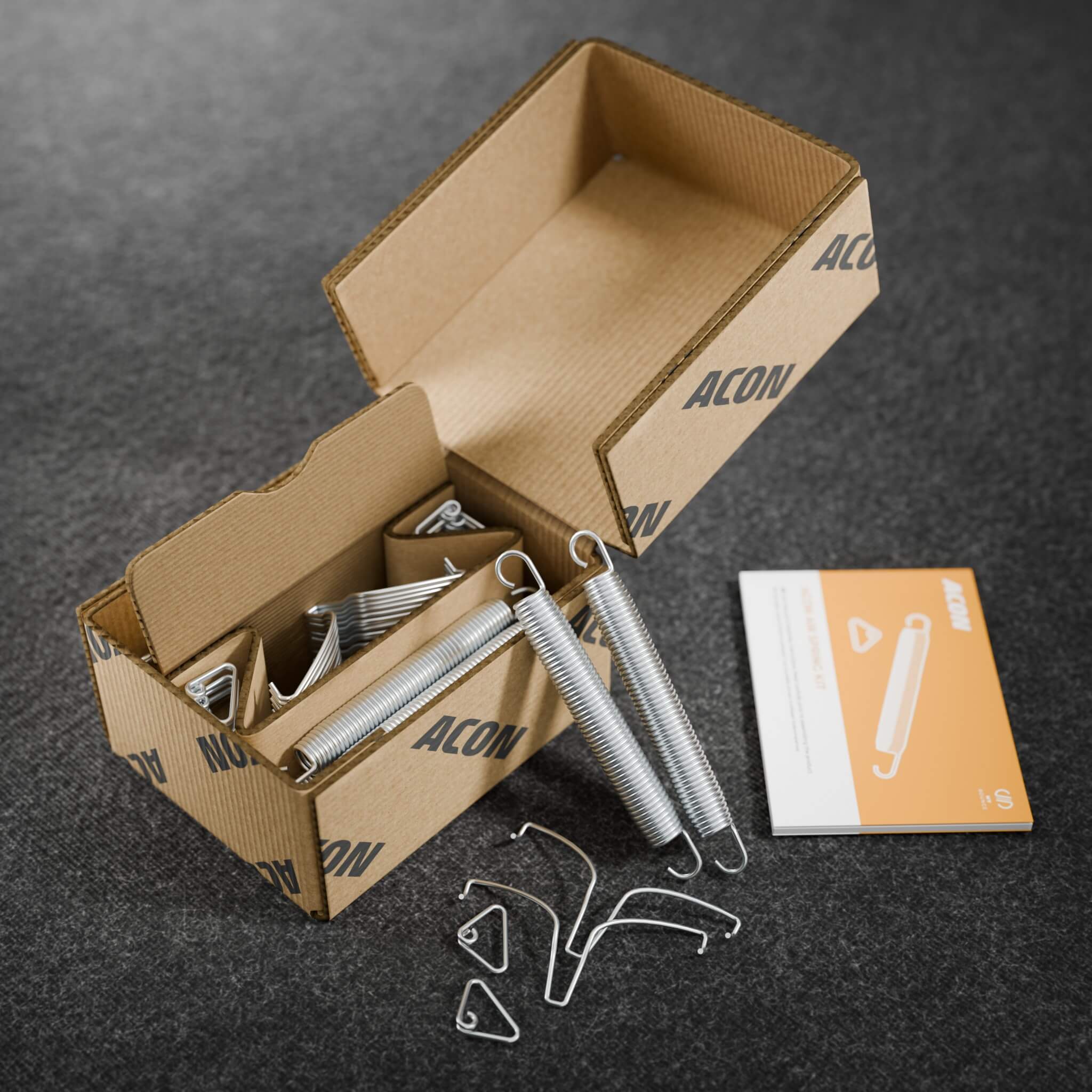 Verpackung des ACON Air zusätzlichen Federsets mit komplettem Federsatz. Enthält alle Teile, die für zusätzliche Federn und ein stabiles, kontrolliertes Sprungverhalten benötigt werden.